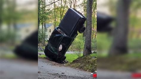Driver escapes injury in wild Amherst, NH crash